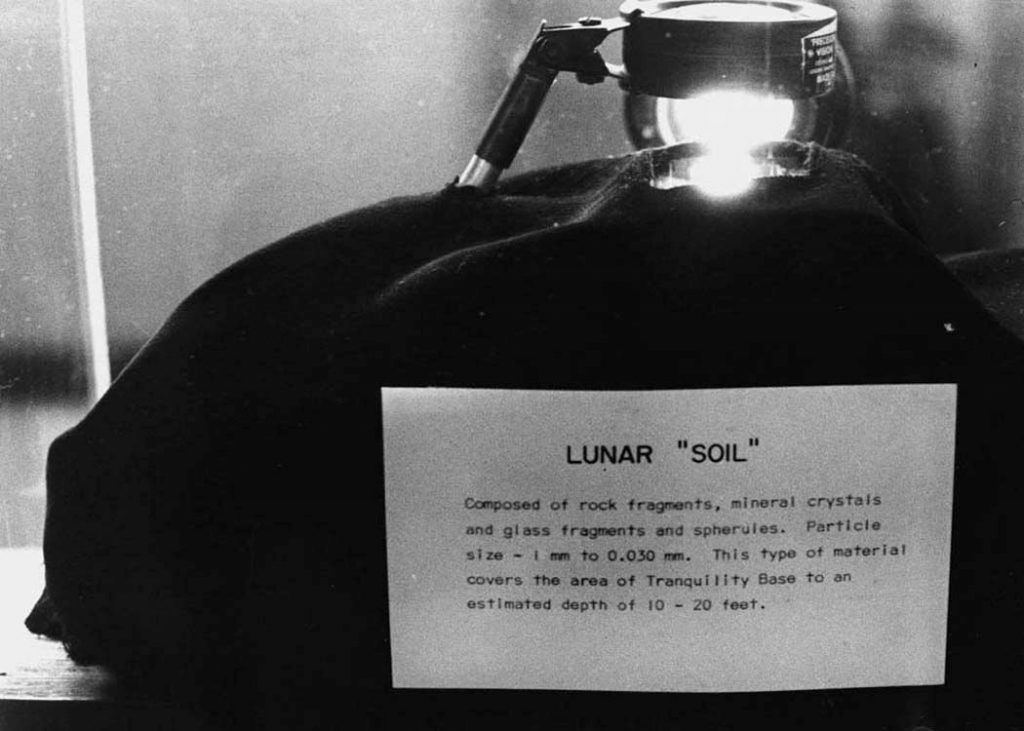 Lunar "Soil" collected during the Apollo 11 spaceflight to the Moon in July 1969 was displayed in the Earth and Space Sciences building on October 19, 1972. Photograph from the University Archives, Stony Brook University Libraries.