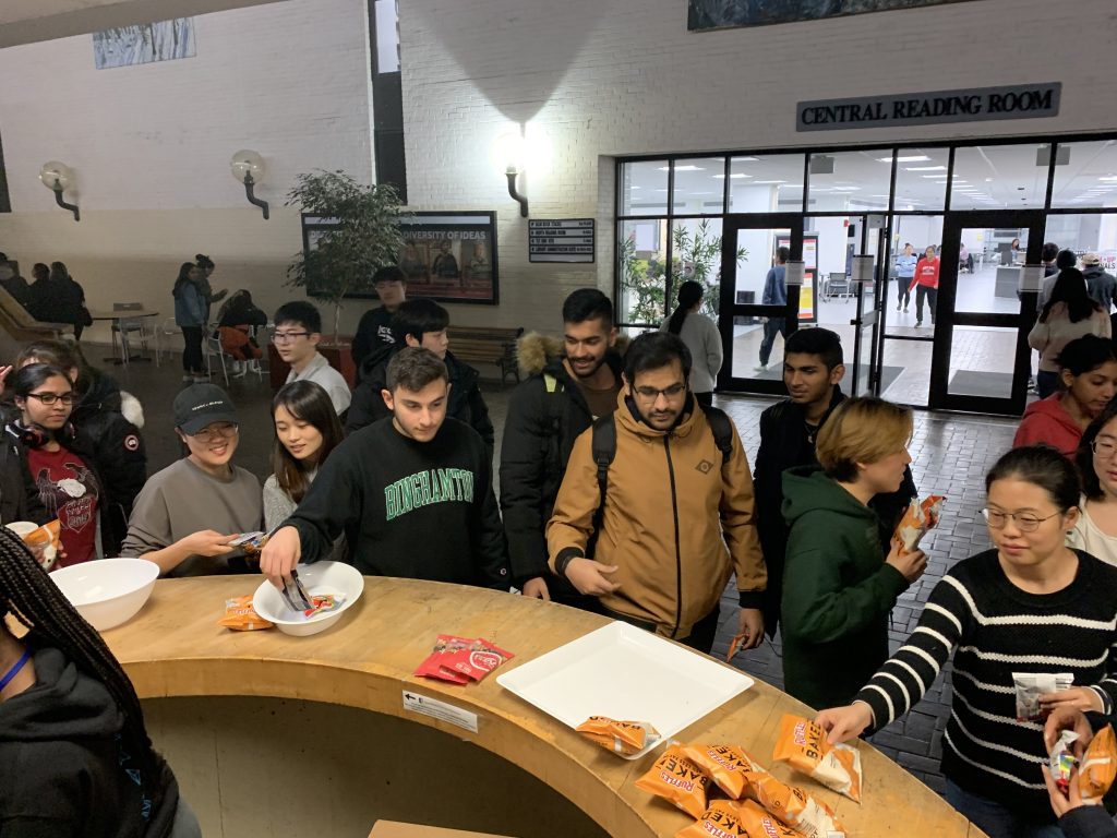 students collecting snacks