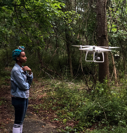 Stony Brook junior Kiara Thomas with drone. Photo by Joshua Joseph.