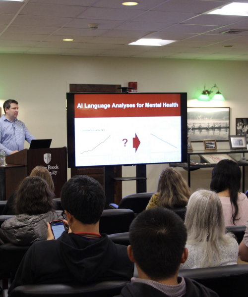 Dr. Schwartz presenting to students