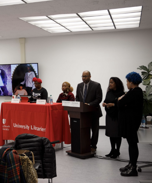 Presenters speaking at podium