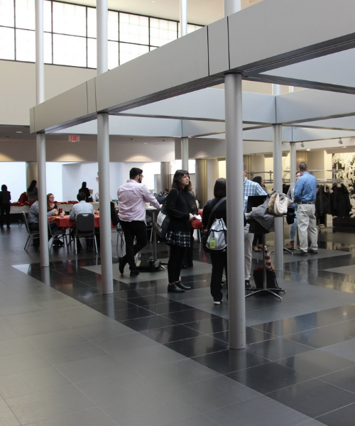 Lobby of people at Open Access Symposium